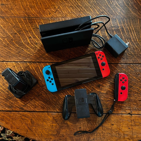 Nintendo Switch with Red and Blue Joy-Con Controllers - Picture 1 of 8